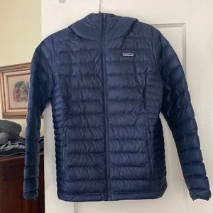 Patagonia jacket.  Navy blue with hood.   Size large.